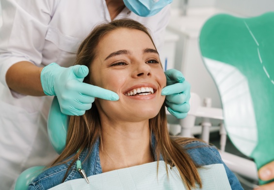 smiling with the best dentist in NJ
